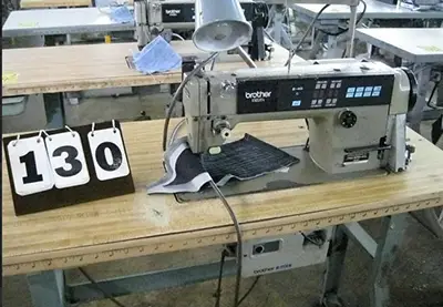 a sewing machine at auction